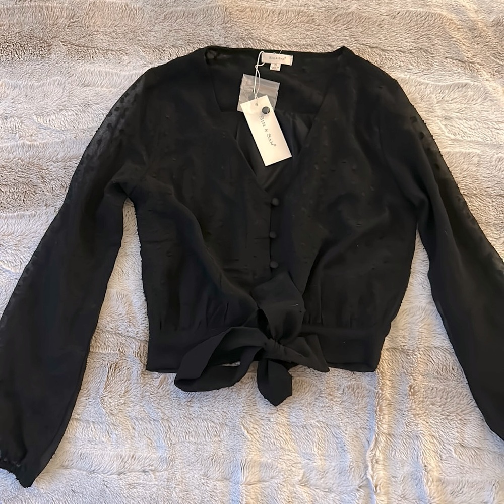 Black button up blouse with polka dots and sheer sleeves. New with tags.